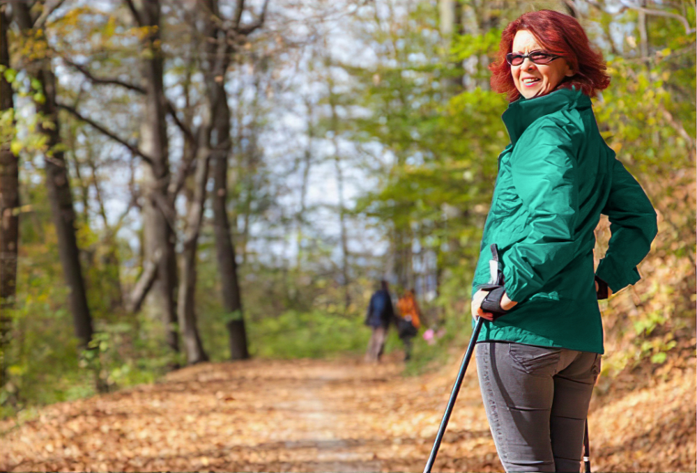 Woman outdoors enjoying Nordic Walking